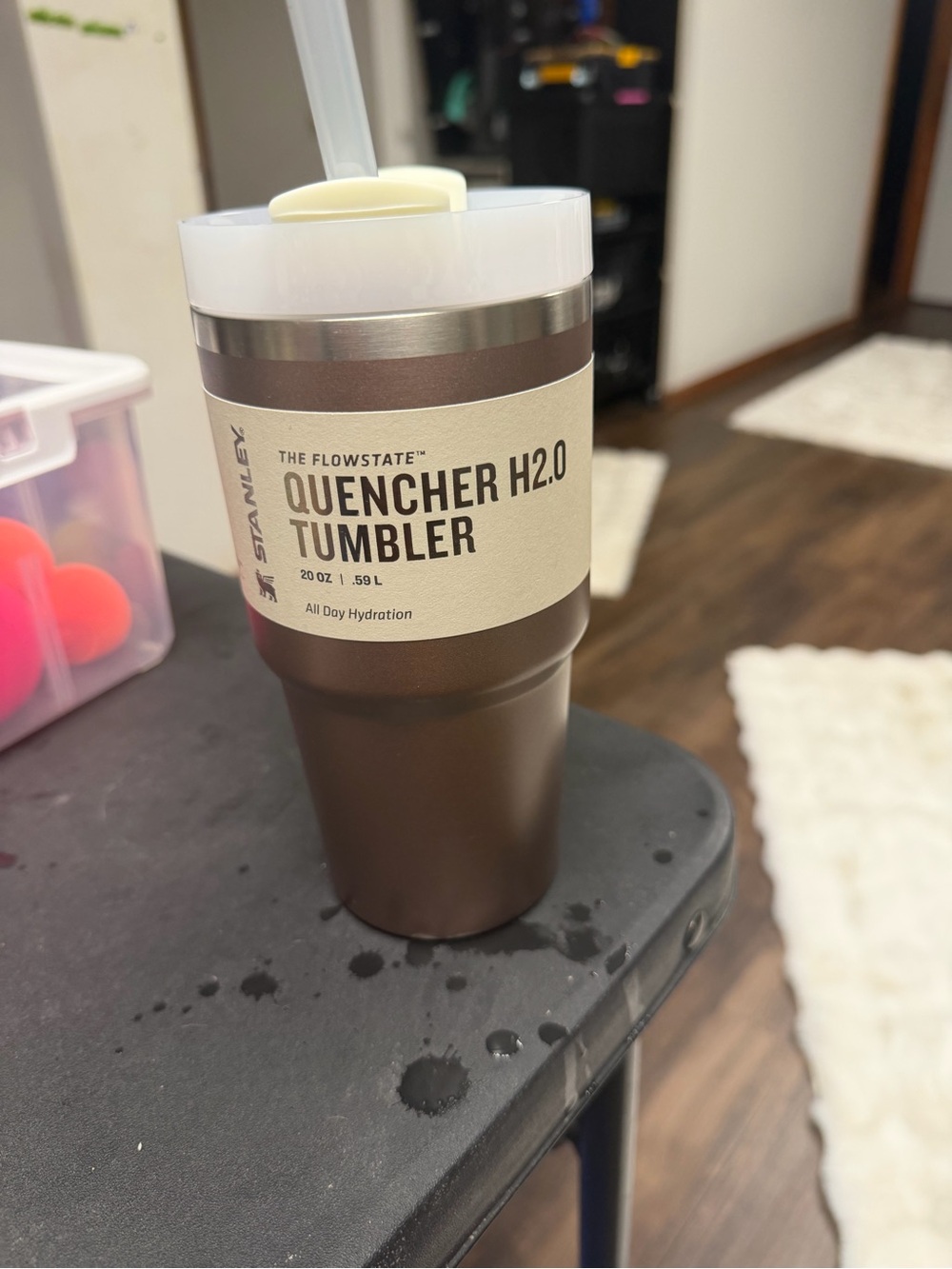 Rose quartz color 20oz Stanley flowstate quencher tumbler with straw lid